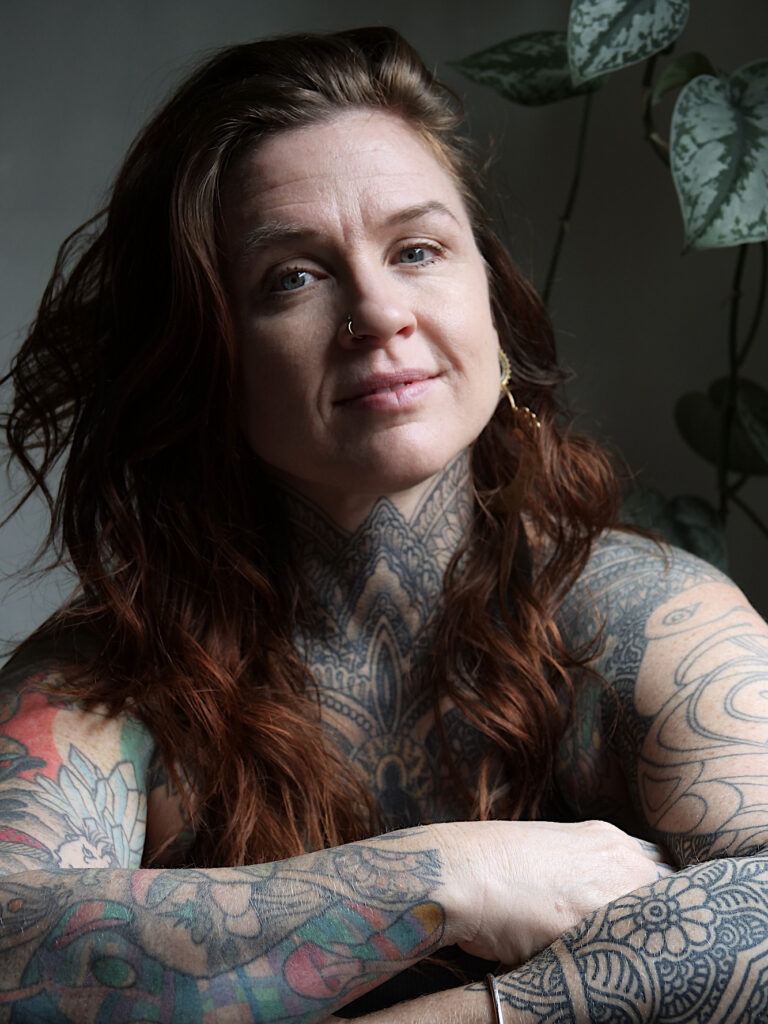Headshot of Erika Ryn, tattoo artist and massage therapist